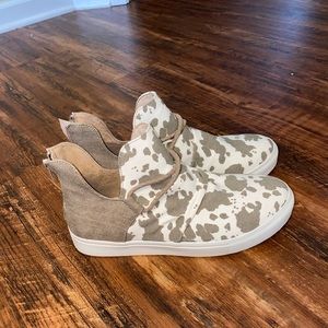 Women’s cow print slip on shoe